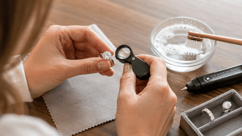 They can clean the stone, observe its fire, use a 10x loupe, and try a moissanite tester if available.