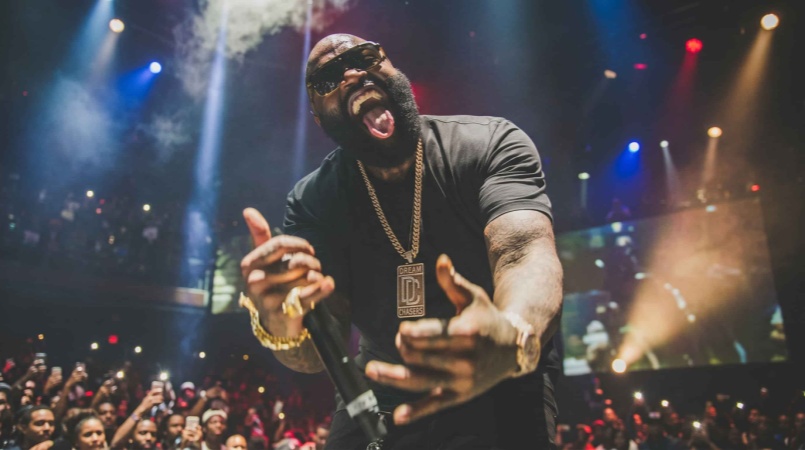 Rick Ross is known for his oversized statement jewelry pieces, often featuring large pendants