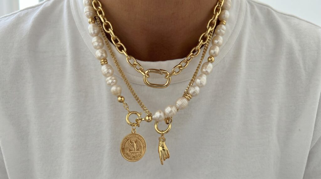 A blend of gold, silver, and other finishes across necklaces, pendants, and bracelets.