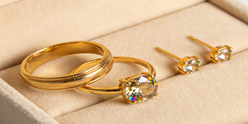  You can pick a gold-plated ring with artificial gems like cubic zirconia or moissanite. 