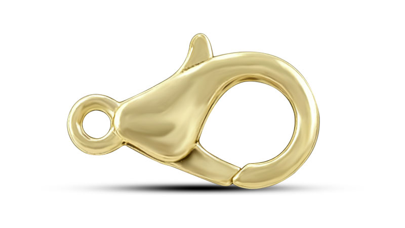 A gold lobster clasp for jewelry.